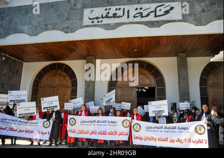 Tunis, Tunisia. 24th Feb, 2022. Tunis, Tunisia. 24 February 2022. The Tunisian Judges Association hold a protest outside the Court of Cassation in Tunis against what they view as constraints placed on the judiciary by President Saied. Tunisian President Kais Saied announced his decision to dissolve the Supreme Judicial Council earlier in February, while extending the state of emergency in the country until the end of 2022 (Credit Image: © Hasan Mrad/IMAGESLIVE via ZUMA Press Wire) Stock Photo