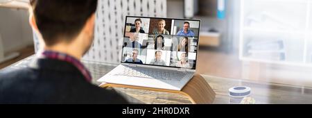 Online Video Conference Webinar. Man Working From Home Stock Photo