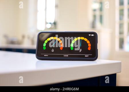 Smart Energy Meter In Kitchen Measuring Consumption Of Domestic Electricity And Gas Stock Photo