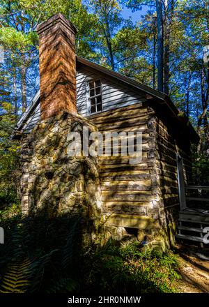 Log Cabin in Forest Setting, North Carolina Botanical Garden, Chapel Hill, North Carolina,, USA Stock Photo