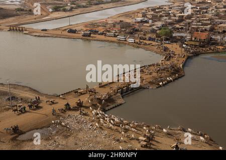 Floodgates at the town of Mboundoum along the Senegal River help regulate the flow of water to irrigation channels throughout the Senegal River Delta. Stock Photo