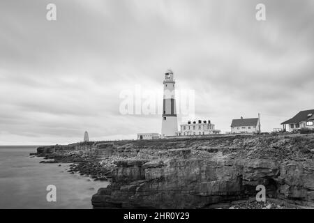 Black and white photo of Portland Bill lighthouse in Dorset at dusk Stock Photo