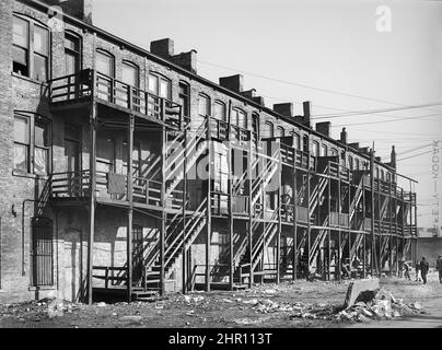 Rear View of Apartment Houses with Wood Staircase, South Side, Chicago, Illinois, USA, Russell Lee, U.S. Office of War Information/U.S. Farm Security Administration, April 1941 Stock Photo