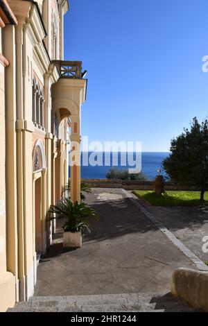 The facade of the church dedicated to Saint Pancras in the village of Conca dei Marini in Italy. Stock Photo