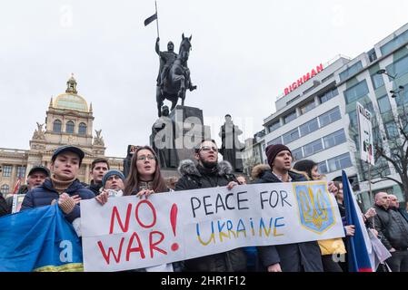 Prague, Czech Republic. 24th Feb, 2022. Protesters hold a banner expressing their opinions during the demonstration. Several thousand demonstrators attended a rally in Prague to show support of Ukraine after Russian president Vladimir Putin authorized military operation in Ukraine. (Photo by Tomas Tkacik/SOPA Images/Sipa USA) Credit: Sipa USA/Alamy Live News Stock Photo