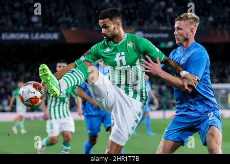 Seville, Seville, Spain. 24th Feb, 2022. William Jose of Real Betis in action with Dmitri Chistyakov of Zenit St. Petersburg during the UEFA Europa League Knockout Round PlayOffs Leg One match between Real Betis and Zenit St. Petersburg at Benito Villamarin Stadium on February 24, 2022 in Seville, Spain. (Credit Image: © Jose Luis Contreras/DAX via ZUMA Press Wire) Stock Photo