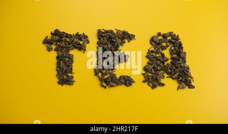 Word tea of dried leaves brewed Stock Photo