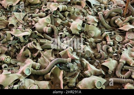Ukraine, in the restricted and uninhabitable 30 kilometer zone around the Chernobyl power plant and the Pripyat labor camp, Gasmask Stock Photo