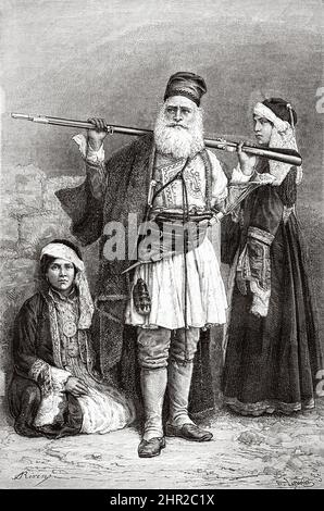 Souliote shepherd and women, Greece. Voyage in Greece by Henri Belle Stock Photo