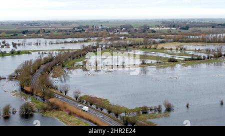 Welney, UK. 23rd Feb, 2022. The Welney wash area is beginning to fill with flood water as the levels of The Old Bedford river and River Delph are being to rise, in Welney, Norfolk, on February 23, 2022 Credit: Paul Marriott/Alamy Live News Stock Photo