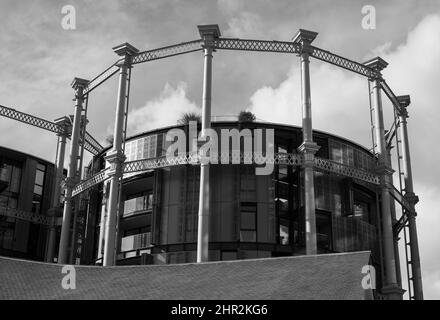 Gasholders building: block of flats built inside disused historic Victorian gas holder at King's Cross, London UK. Photographed from Coal Drops Yard. Stock Photo