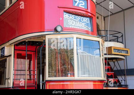 Derbyshire, UK – 5 April 2018: A vintage tram stored in the vehicle garage at Crich Tramway Village, the national tram museum Stock Photo