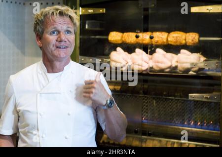 Chef Gordon Ramsay speaks to reporters during a cooking demonstration at his new restaurant 'Laurier Gordon Ramsay', in Montreal, Tuesday, August 9, 2011. THE CANADIAN PRESS/Graham Hughes Stock Photo