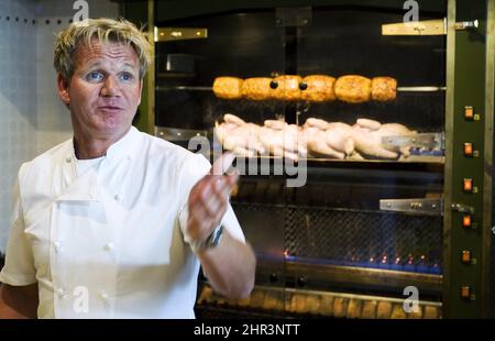 Chef Gordon Ramsay speaks to reporters during a cooking demonstration at his new restaurant 'Laurier Gordon Ramsay', in Montreal, Tuesday, August 9, 2011. THE CANADIAN PRESS/Graham Hughes Stock Photo