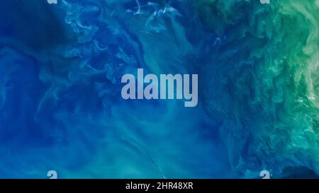 Top view of colorful and windy deep blue sea horizontal background, aerial photo of beautiful turquoise ocean.Elements of this image furnished by NASA Stock Photo