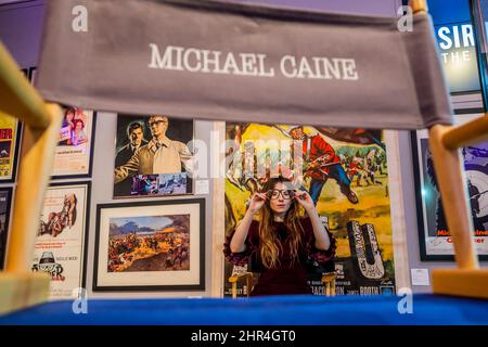 London, UK. 25th Feb, 2022. A directors chair with posters and glasses - A preview of the Sir Michael Caine: The Personal Collection sale at Bonhams New Bond Street, London. The sale itself takes place on Wednesday 2 March in London. Credit: Guy Bell/Alamy Live News Stock Photo