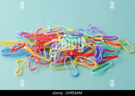 rainbow color Rubber bands on color background  Stock Photo