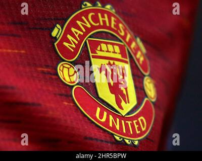 File photo dated 05-08-2020 of a Manchester United badge on a strip. United have ended their sponsorship deal with Aeroflot following Russia's invasion of Ukraine. Issue date: Friday February 25, 2022. Stock Photo