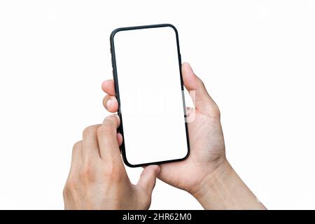 Male hand holding smartphone with blank screen isolated on white background. Stock Photo