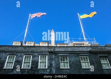 London, UK. 25th Feb, 2022. At Downing Street, the flag of Ukraine flies next to the Union Jack above Number 10. Credit: Imageplotter/Alamy Live News Stock Photo