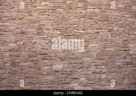 stone wall of the old fortress background texture Stock Photo