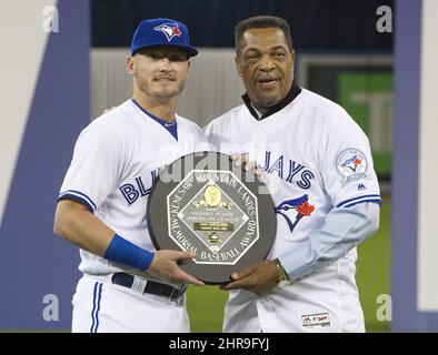 Toronto Blue Jays alumni George Bell reacts after throwing out the  ceremonial first pitch prior to start of American League MLB baseball  action between the Toronto Blue Jays and Baltimore Orioles, in