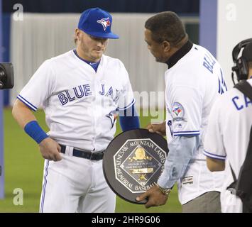 Toronto Blue Jays alumni George Bell reacts after throwing out the  ceremonial first pitch prior to start of American League MLB baseball  action between the Toronto Blue Jays and Baltimore Orioles, in