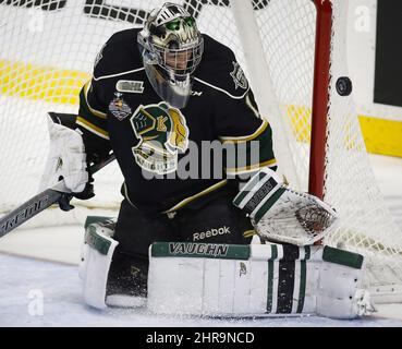 London Knights goalie Tyler Parsons stops a shot during first