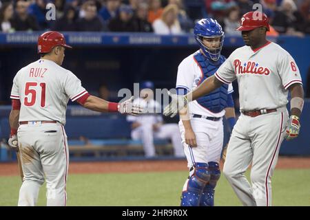 Philadelphia Phillies' Jayson Werth, right, is congratulated by teammate  Pat Burrell after Werth scored during the first inning of a baseball game  against the San Diego Padres Saturday, Aug. 16, 2008, in