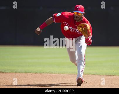 Philadelphia Phillies first baseman Ryan Howard, right, catches the throw  from shortstop Jimmy Rollins to retire the Atlanta Braves' Justin Upton,  left, in the first inning at Turner Field in Atlanta on