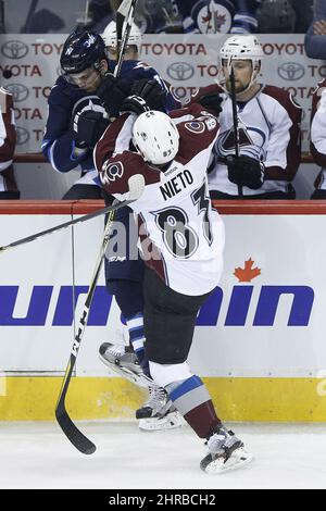 Colorado Avalanche's Matt Nieto (83) and Boston Bruins' Charlie McAvoy ...