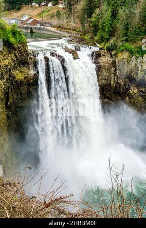 Roaring and misty Snoqualmie Falls in Washington State. Stock Photo