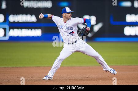 Toronto Blue Jays Josh Donaldson (L), Troy Tulowitzki (C), and Ryan Goins  celebrate defeating the Cleveland Indians in game four of the American  League Championship Series at Rogers Centre on October 18