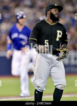 Pittsburgh Pirates second baseman Josh Harrison acknowledges the fans as he  leaves the field at PNC Park after being replaced in the eighth inning of a  baseball game against the Milwaukee Brewers