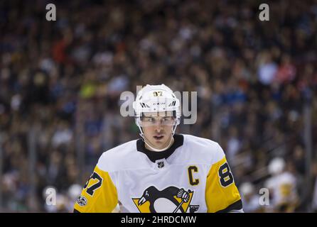 Pittsburgh Penguins' Sidney Crosby prepares to take a face-off in the third  period of an NHL Stadium Series hockey game against the Philadelphia Flyers  at Heinz Field in Pittsburgh, Saturday, Feb. 25
