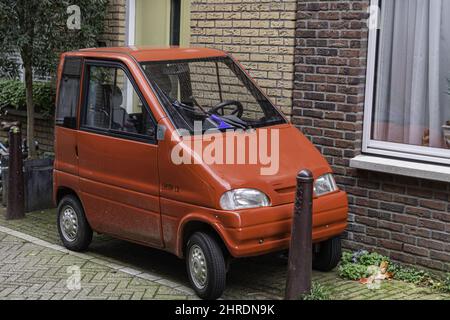 Little minicar canta XL parked in the street Stock Photo