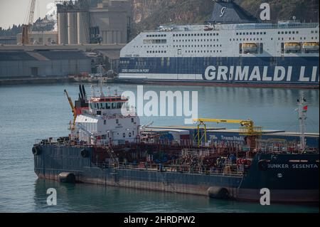 Cargo ship in the industrial port Stock Photo