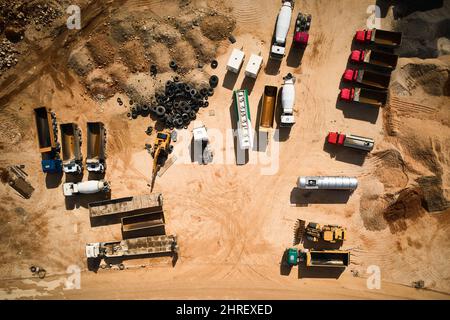 Parked trucks top down aerial view Stock Photo