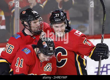 From left to right, Vegas Golden Knights defenseman Alec Martinez,  goaltender Marc-Andre Fleury and defenseman Zach Whitecloud celebrate as  time runs out in the third period of an NHL hockey game against