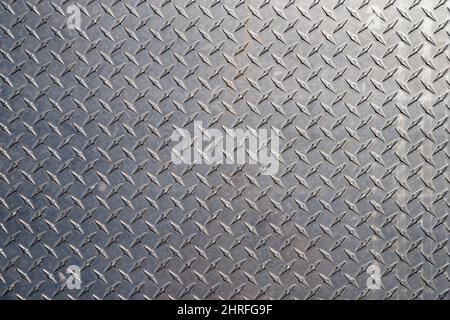 no slip new diamond textured metal plate background texture Stock Photo