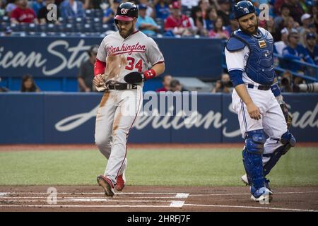 The jersey of Washington Nationals' Bryce Harper is signed on the letters  as he prepares to bat during the inning first inning against the New York  Mets at Nationals Park, Sunday, Sept.