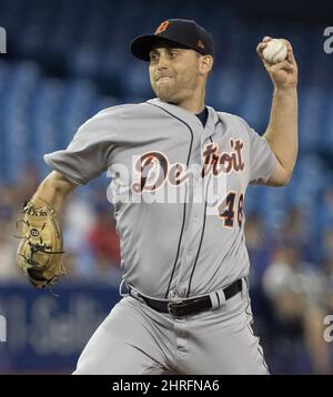 Detroit Tigers starting pitcher Matthew Boyd (48) stands on the mound with  teammates before leaving during the first inning of a baseball game against  the Texas Rangers in Arlington, Texas, Monday, June