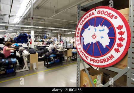 https://l450v.alamy.com/450v/2hrgh56/canada-gooses-ceo-dani-reiss-has-spent-considerable-time-and-money-trying-to-stop-the-flow-of-counterfeited-goods-but-reiss-has-a-complicated-relationship-with-fake-products-because-he-admits-they-can-have-benefits-employees-work-with-canada-goose-jackets-at-the-canada-goose-factory-in-toronto-on-thursday-april-2-2015-the-canadian-pressnathan-denette-2hrgh56.jpg