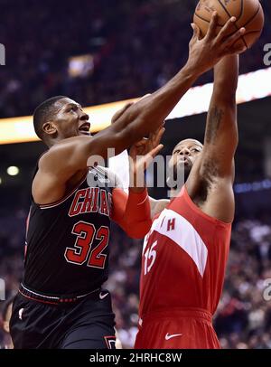 The Chicago Bulls' Kris Dunn (32) drives against the Dallas Mavericks'  Dwight Powell (7) in the second half at the American Airlines Center in  Dallas on Friday, Jan. 5, 2018. The Bulls