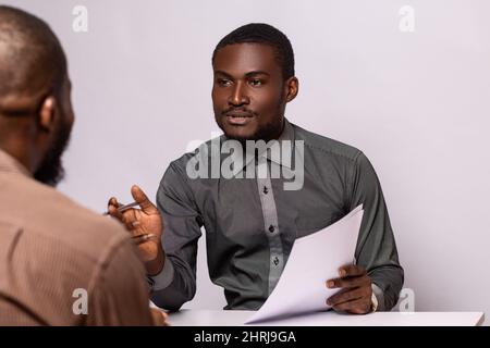African business man talking to a colleague Stock Photo