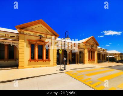 Entrance and facade of Wagga Wagga city train railway station under blue sky. Stock Photo