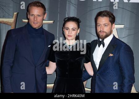 LONDON, ENGLAND - FEBRUARY 24:  Sam Heughan, Sophie Skelton and Richard Rankin attend the UK Premiere of 'Outlander' Season Six at The Royal Festival Stock Photo