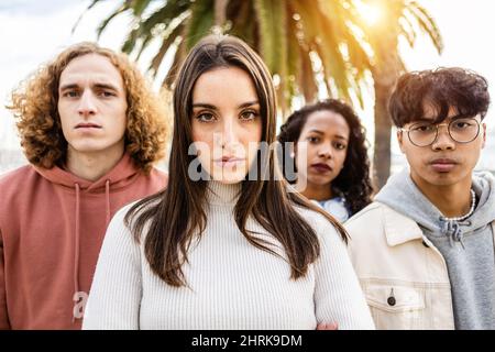 Portrait of unhappy millennial group of young people Stock Photo
