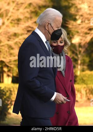 Washington DC, USA. 25th Feb, 2022. President Joe Biden (L) and First Lady Jill Biden depart the White House, Friday, February 25, 2022, Washington, DC. The Bidens will spend the weekend at their home in Delaware. Photo by Mike Theiler/UPI Credit: UPI/Alamy Live News Stock Photo