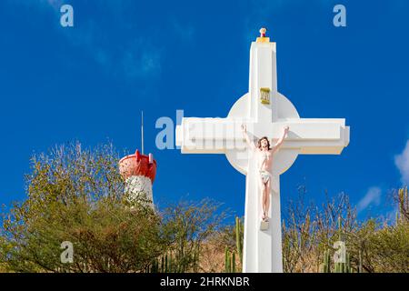 Large white cross, Le Calvaire Cross with Christ figure in St Barts Stock Photo